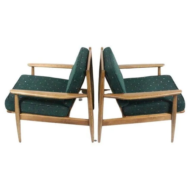 American Mid Century Viko Baumritter attributed Wide Walnut Lounge Chairs. Featuring sturdy framework, angled spindle...