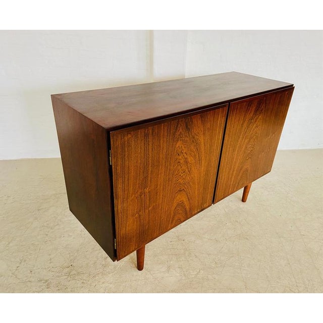 Vintage Danish Mid-Century Rosewood Sideboard by Gunni Omann, 1960s Crafted in Denmark in the 1960s, this stunning...