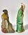 Quaint small ceramic Chinese figurine. The walking staff of the standing figure is broken off at the top. The fan in the...