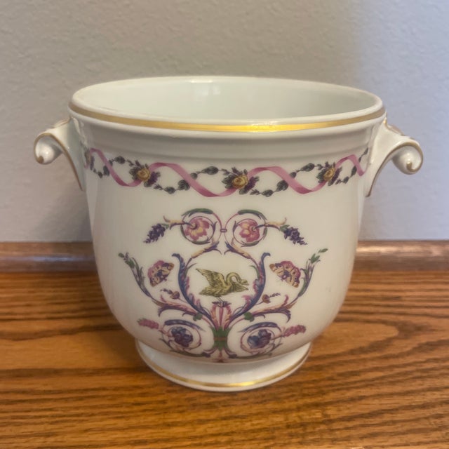 Bought in Florence, Italy. Wonderful porcelain piece with colors in pink , purple & green. Both rims and decorative...