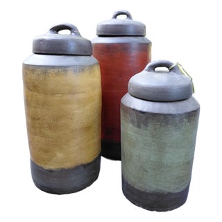 Set of Three Rustic Handcrafted Lidded Stoneware Storage Jars For Sale