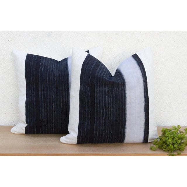 This striking pair of decorative pillows captures the clean, graphic aesthetic of traditional hill tribe artistry. Each...