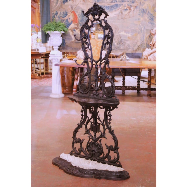 Place this elegant antique French hall tree in an entry or mud room to introduce both function and architectural presence....