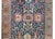 A rare and gorgeous early 20th century Persian Heriz rug with an unusual pattern containing two different large-scale...