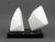 Modernist Abstract White Marble Sculpture, 1986, comprised of two carved white marble pieces mounted on a black stone...