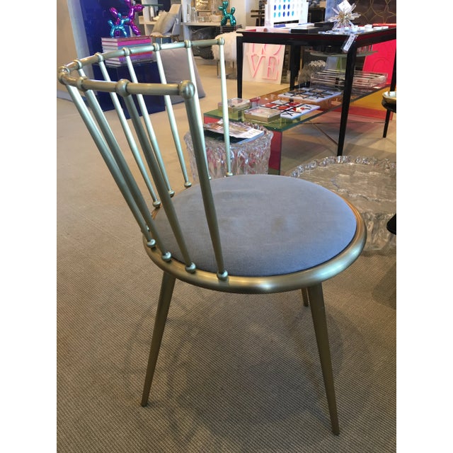 Aurora, modern design “Windsor” chair with steel framework and padded seat.‎ The barred back is assembled with internal...