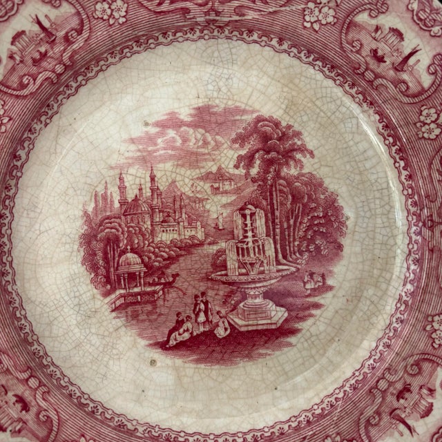 A stunning antique English transferware plate, circa 1800s, in the pattern entited "Medina". Outer rim is encircled with 8...