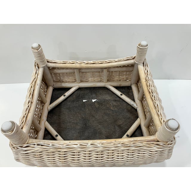 This pair of wicker footstools from the 90’s looks like they were never used. The condition of the wicker and fabric is...