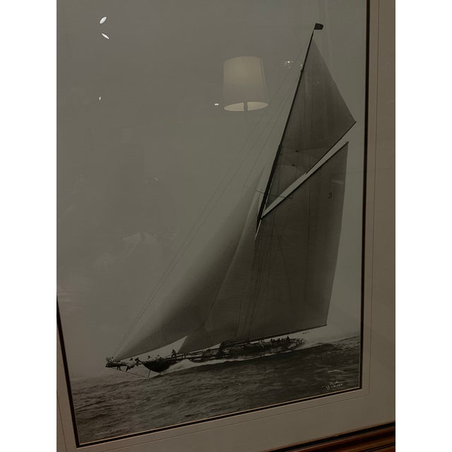 Framed “Shamrock III” photographic print by Beken of Cowes, a renowned British maritime photography firm established in...