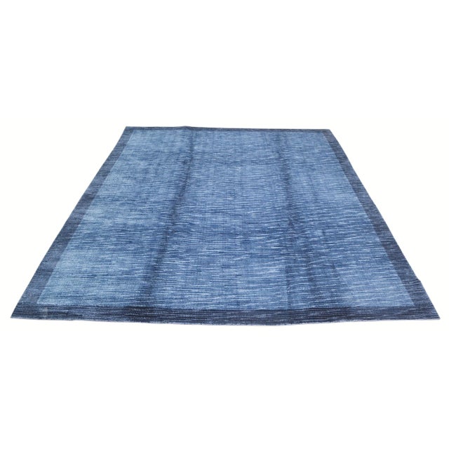 Modern minimalist silk hand knotted rug with natural colors, contemporary style and soft texture.