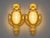 This elegant pair of 1970s French Louis XVI–style wall sconces combines finely detailed bronze craftsmanship with a warm...