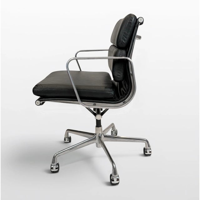 A beautifully restored Eames Aluminum Group Soft Pad Management Chair, originally designed by Charles and Ray Eames....
