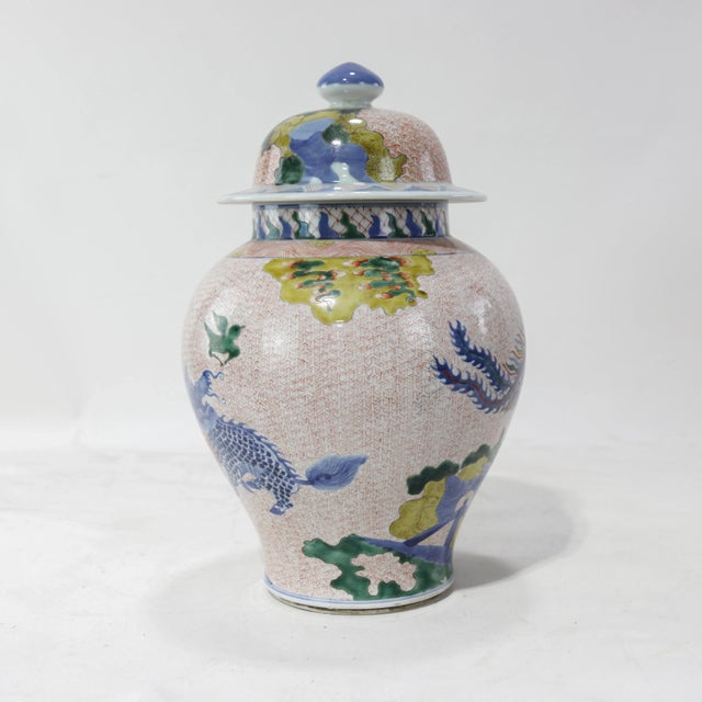 Early 20th Century Pair of Chinese Late Qing Dynasty, Jingdezhen Kiln, Famille Verte Covered Jar With Kirin and Phoenix on Iron-Red Brocade Ground For Sale - Image 5 of 16