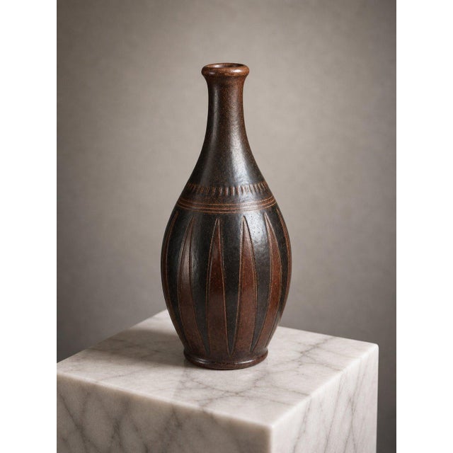 A refined and sculptural mid-century stoneware vase designed by Arthur Andersson for Wallåkra Stenkärlsfabrik, Sweden,...