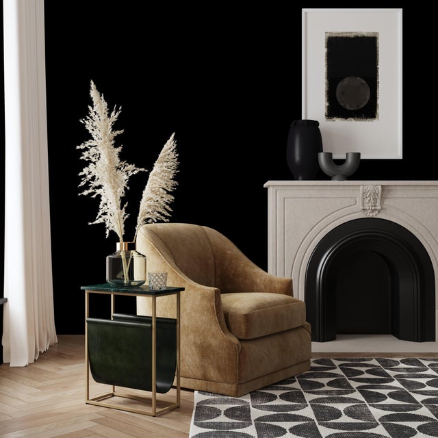 A stunning combination of marble, iron, and leather! This magazine table is a beautiful complement to any space.Item is...