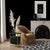 A stunning combination of marble, iron, and leather! This magazine table is a beautiful complement to any space.Item is...