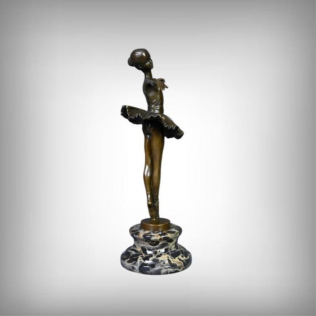 Elegant and ethereal, this bronze ballerina by Crespain embodies the timeless grace of classical ballet. Frozen in perfect...