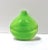 A striking 1970s hand-blown art glass vase in vivid lime green with subtle internal swirled movement. The rounded...