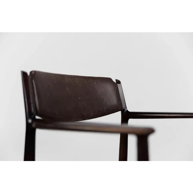 This modernist chair was designed by the world-famous Danish designer Arne Vodder during the 1960s. The organic-shaped...
