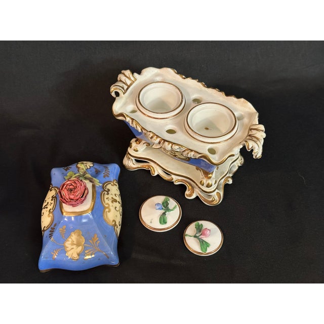 Antique 19th-century French porcelain double inkstand in the Rococo Revival style, with elaborate molded decoration, hand-...
