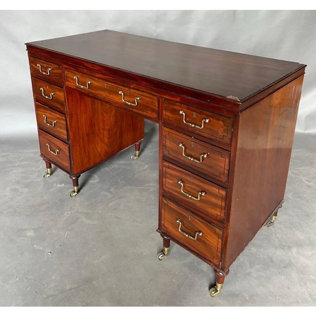 Fantastic early 19th century Regency period metamorphic dressing desk. The solid mahogany writing surface is actually a...