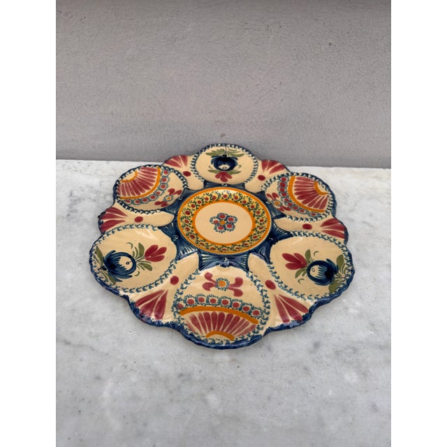 French faience oyster plate signed Henriot Quimper, circa 1930.
