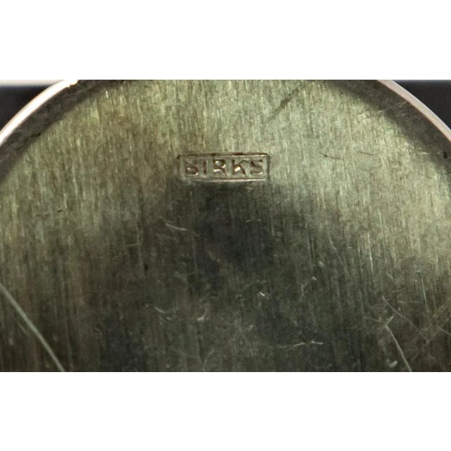 Offering this stunning sterling silver ring box. Starting on the inside of box with a gold velvet slotted pad for the...