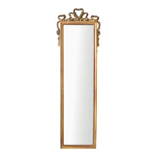 Late 20th Century 52" Tall French Louis XVI Ribbon Crest Bevelled Dressing Mirror by Carolina Mirror Company For Sale