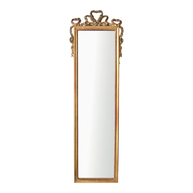 Late 20th Century 52" Tall French Louis XVI Ribbon Crest Bevelled Dressing Mirror by Carolina Mirror Company For Sale
