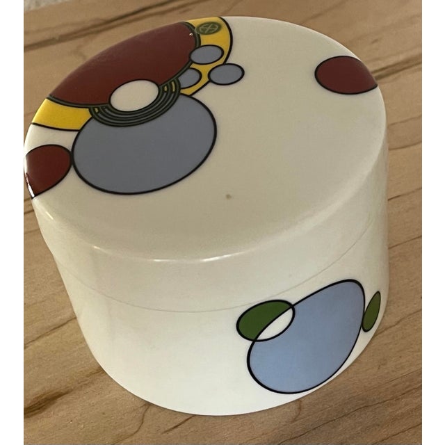 This Tiffany & Company porcelain lidded trinket dish/sugar bowl was produced in 1990. It features a modern twist inspired...