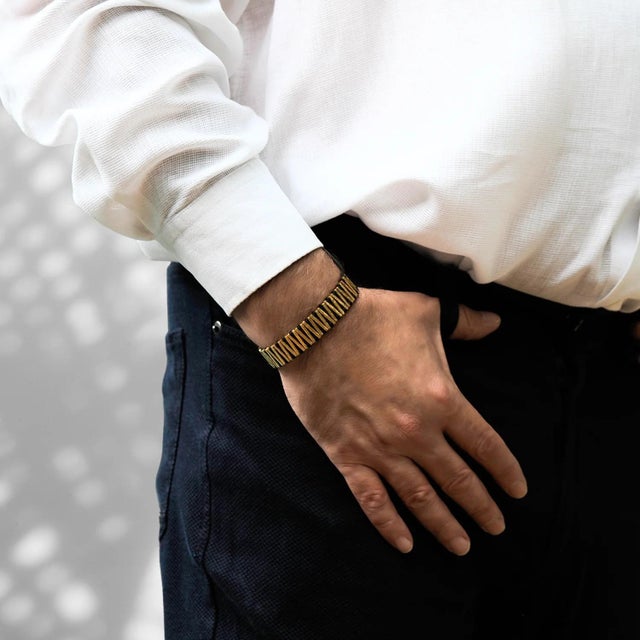 The Black & Gold Woven Unisex Adjustable Bracelet is a harmonious fusion of tranquil aesthetics, unisex elegance, and...