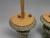 Pair of painted tole metal palm-form candlesticks, unmarked, likely mid-20th century and in the Italian or Continental...