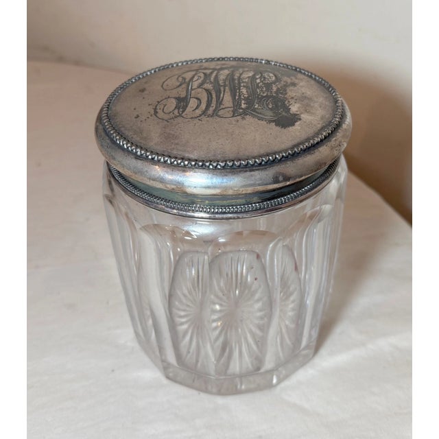 This antique crystal and silverplate tobacco jar humidor is a stunning piece that will add elegance to any collection. The...