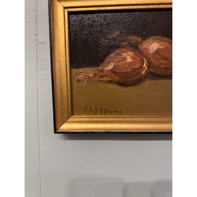 This 20th Century American oil on canvas depicting a still life of onions in warm, earthy tones with expressive brushwork....