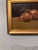 This 20th Century American oil on canvas depicting a still life of onions in warm, earthy tones with expressive brushwork....