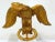 This 18th-century English carved giltwood eagle, hailing from the Georgian period, is a magnificent example of artisan...