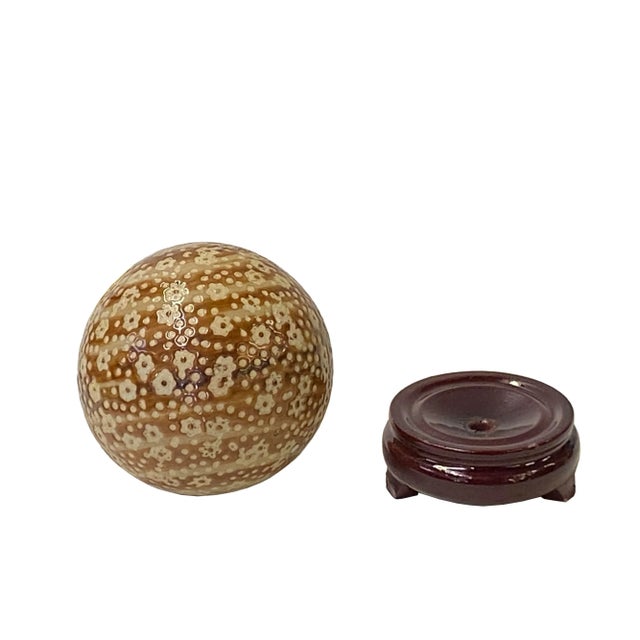 This is a simple tan beige brown mixed color floral dots pattern porcelain ball display . Dimensions: Ball Dia 4" with...