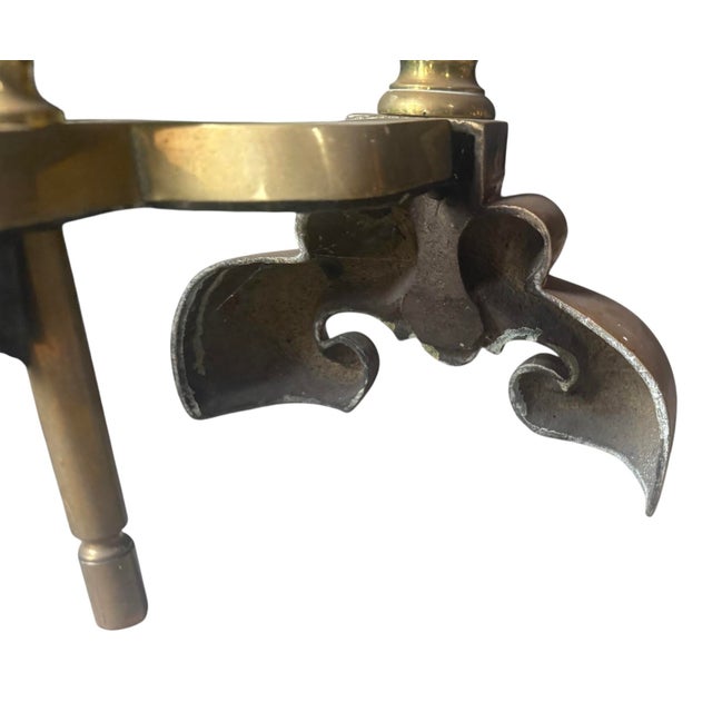 Exceptional pair of vintage brass andirons, executed in the Anglo Dutch style. The andirons are in excellent, original...