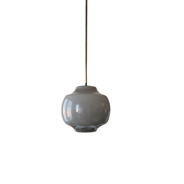 Elegant Murano blown glass pendant lamp by Alessandro Pianon, a renowned designer and architect who collaborated...