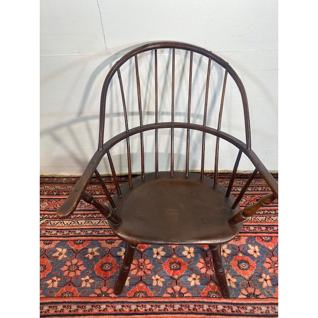 Step into a piece of early American history with this beautiful antique barrel-back desk chair, a refined and functional...