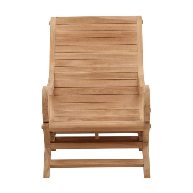 Teak wood lounge chair with slatted teak wood sloped back chair with carved wood arm and legs. Very comfortable seating...