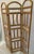 This light brown rattan room divider has a beautiful mid century feel that will add a touch of style and boho chic to your...