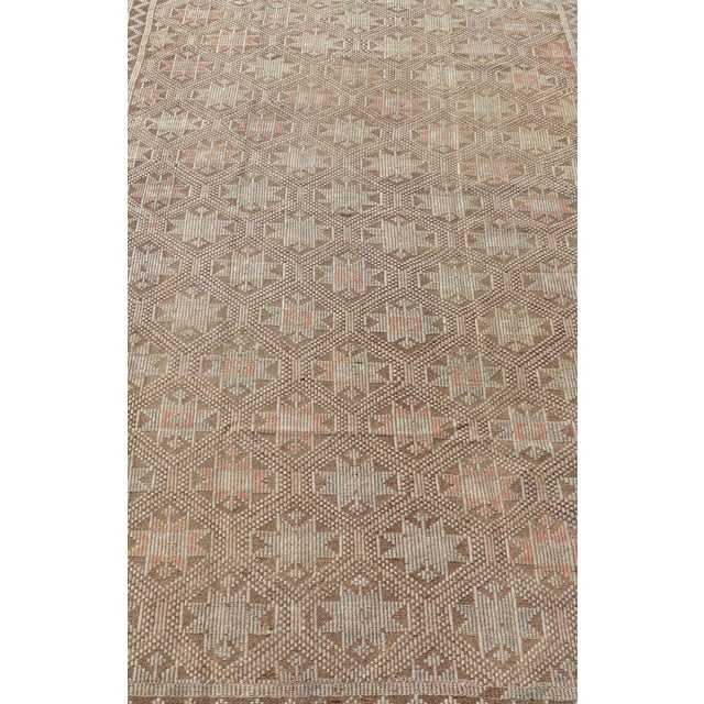 Measures: 5'2 x 9'3 Vintage Turkish Embroidered Kilim with All-Over Star Design on A Taupe Ground. Keivan Woven Arts / rug...