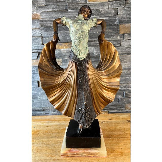 This 17-inch tall (without the base) Art Deco bronze sculpture reproduction captures the artistry, detail and skill of the...