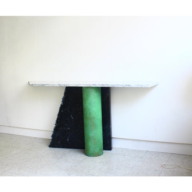 Italian console table model Ambiguità, designed by Lella and Massimo Vignelli and produced by Casigliani in the 1980s,...
