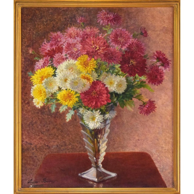 Vintage floral still life painting by French American Artist Lucien Biva. Oil on canvas, presented in a gilt plein air...