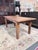 Rich in authentic character and rural craftsmanship, this antique primitive harvest table embodies the timeless appeal of...