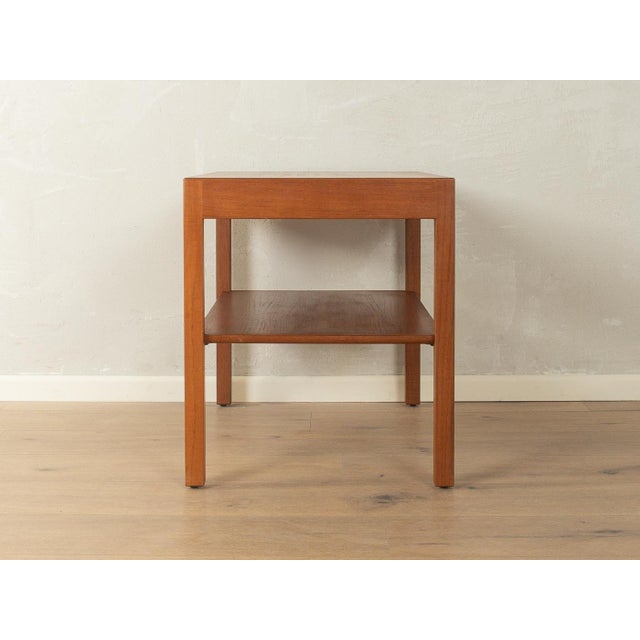 Classic coffee table by Hans J. Wegner for Tuck-Furniture from the 1960s. High-quality teak frame and teak veneer...