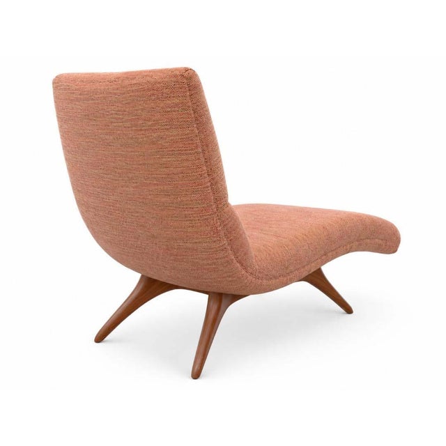 A pair of contemporary chaise lounges designed by Vladimir Kagan, with single sloped arm and self welt detailing all...