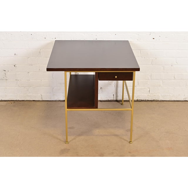 An outstanding Mid-Century Modern bedside table or occasional side table By Paul McCobb for Directional and produced by...